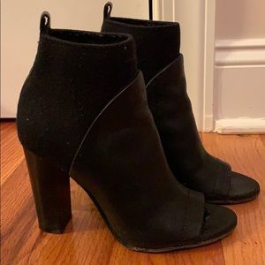 Black open toed booties by Vince